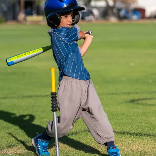 Melville Mariners tee-ball player hitting from a tee
