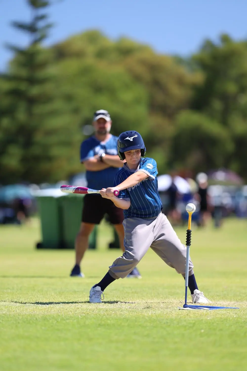 Melville Mariners player hitting a baseball