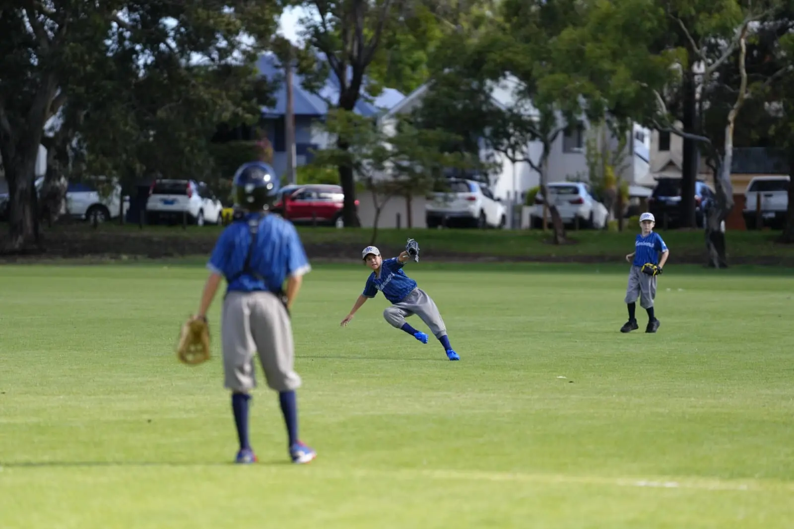 Melville Mariners players fielding during a game