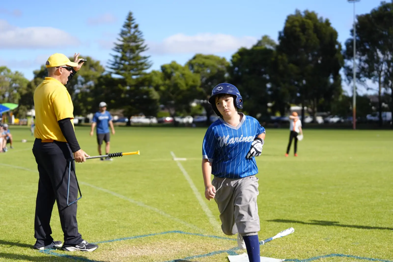 Melville Mariners player running from home plate